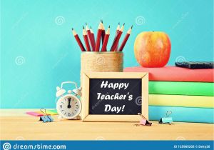 Background for Teachers Day Card Happy Teachers Day School and Office Supplies On A Gray