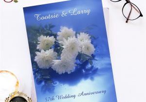 Card for Anniversary with Name This Beautiful Image Shows White Flowers On A Blue Lighted