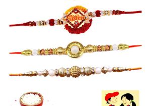 Handmade Greeting Card for Rakhi theally Four Traditional Fancy Rakhi for Men N Boys with Greeting Card and Roli Chawal for Tilak