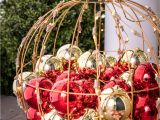 Over the Door Christmas Card Holder Metal A Beautiful Red and Gold Lighted orb Filled with ornaments