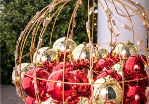 Over the Door Christmas Card Holder Metal A Beautiful Red and Gold Lighted orb Filled with ornaments