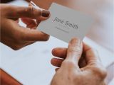 What to Write In A Blank Card Download Premium Psd Of Woman Handing A Business Card Mockup