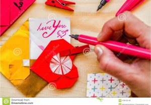 What to Write In Wife S Valentine S Card Valentine S Day Holiday Woman S Hand Writing with Pink Pen